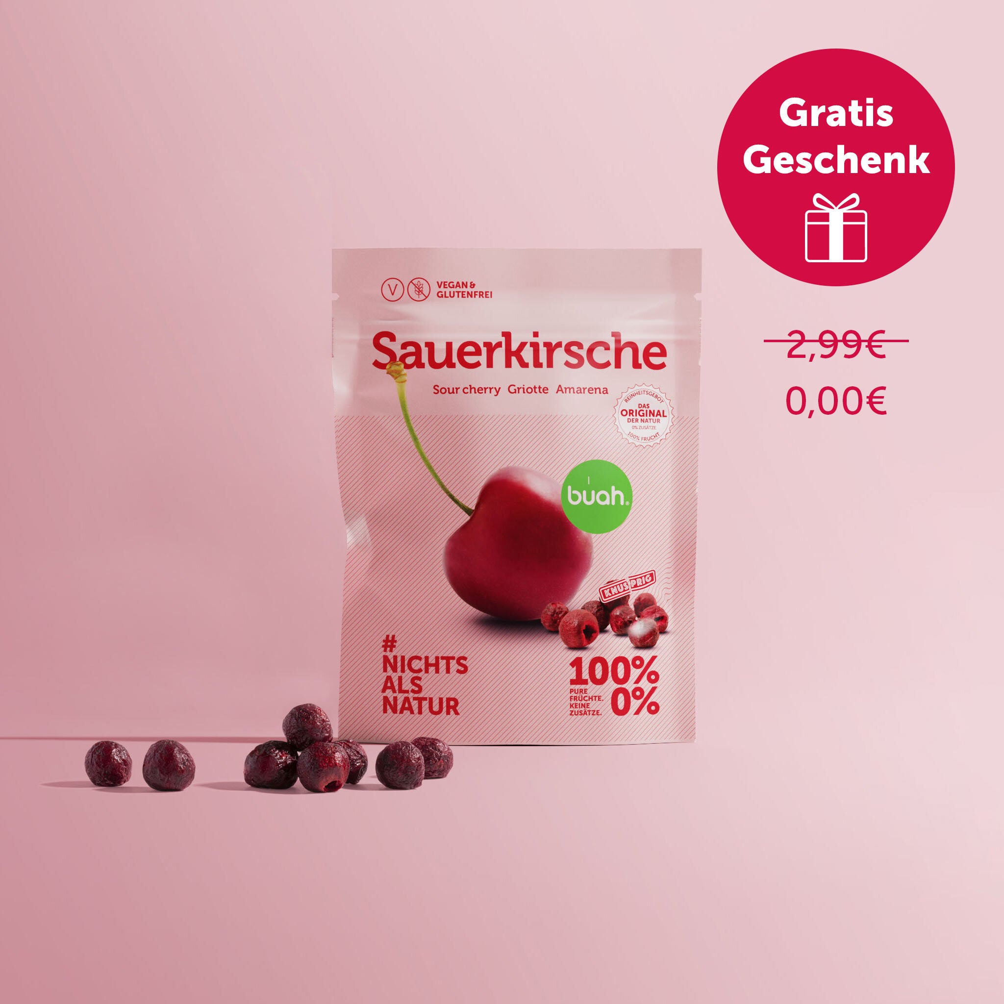 buah birthday, 10 Jahre buah, Gratis Geschenk Badge auf Abbildung des buah Sauerkirsche Snackpack vor rotem Hintergrund