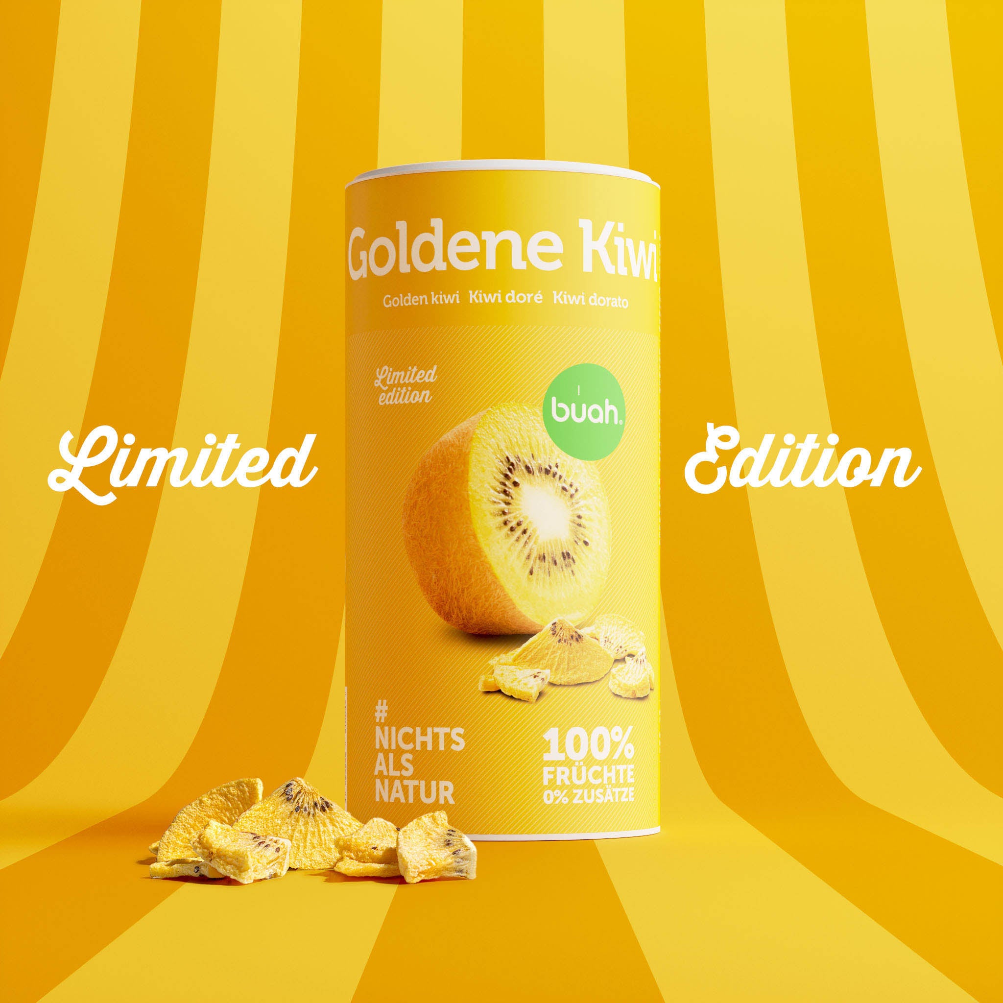 Eine gelbe Dose buah gefriergetrocknete Goldene Kiwi steht mit einigen Fruchtstücken auf einem gelb-orange gestreiften Hintergrund. Links und rechts der Dose steht in weißer geschwungener Schrift „Limited Edition“.