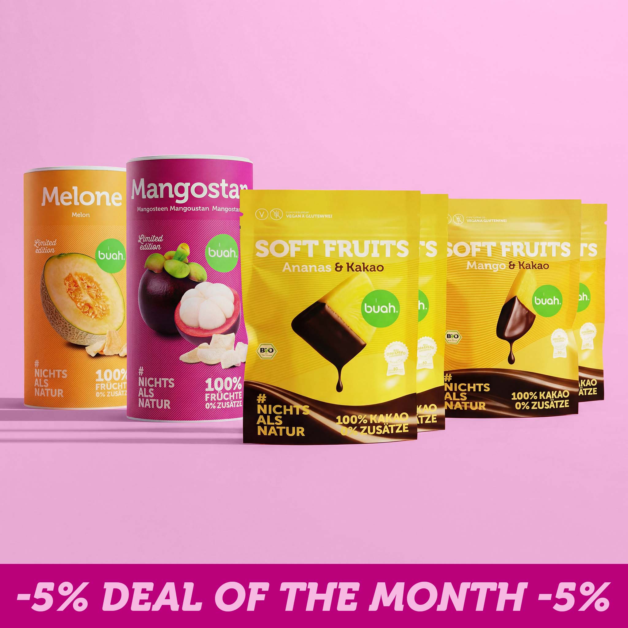 Two large cans of freeze-dried buah fruits (melon and mangosteen) stand next to three yellow pouches of buah Soft Fruits (Pineapple & Cocoa, Mango & Cocoa). A banner at the bottom reads "-5% Deal of the month -5%".