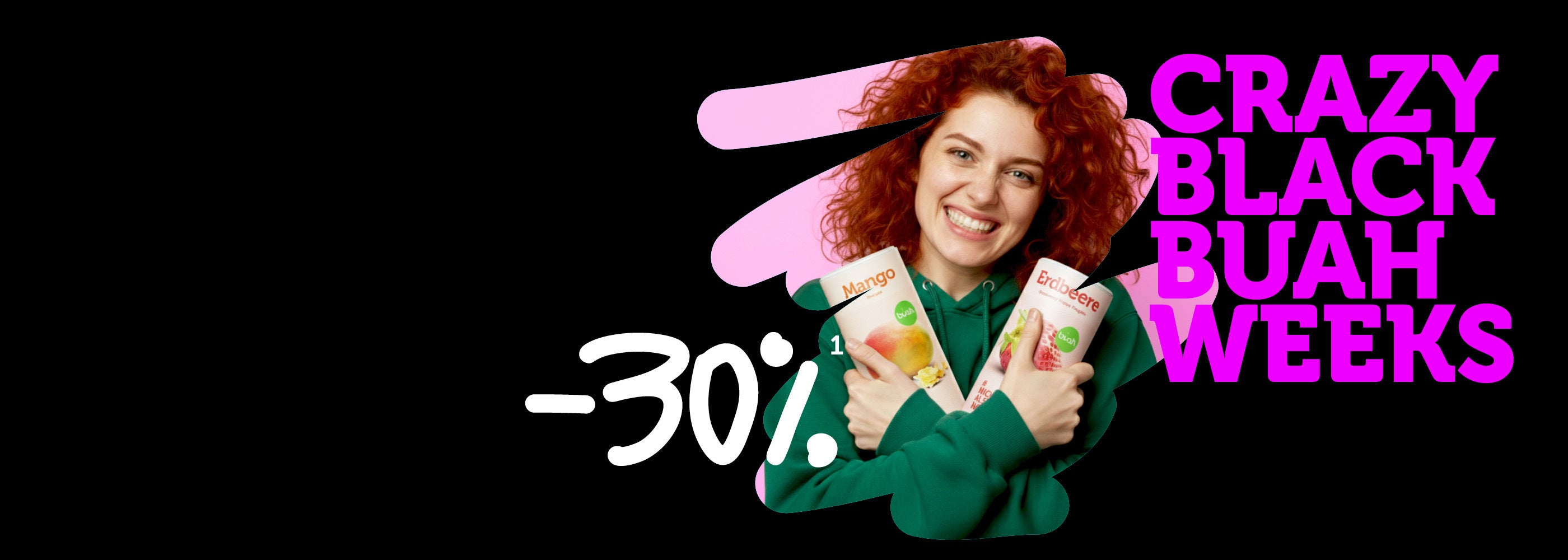Junge Frau mit roten Locken und gruenem Hoodie hält eine Dose buah Mango und eine Dose buah Erdbeere in der Hand, Schriftzug Crazy Black buah Weeks in grellem Pink vor schwarzem Hintergrund, 30 % Rabatt Badge am unteren Bildrand